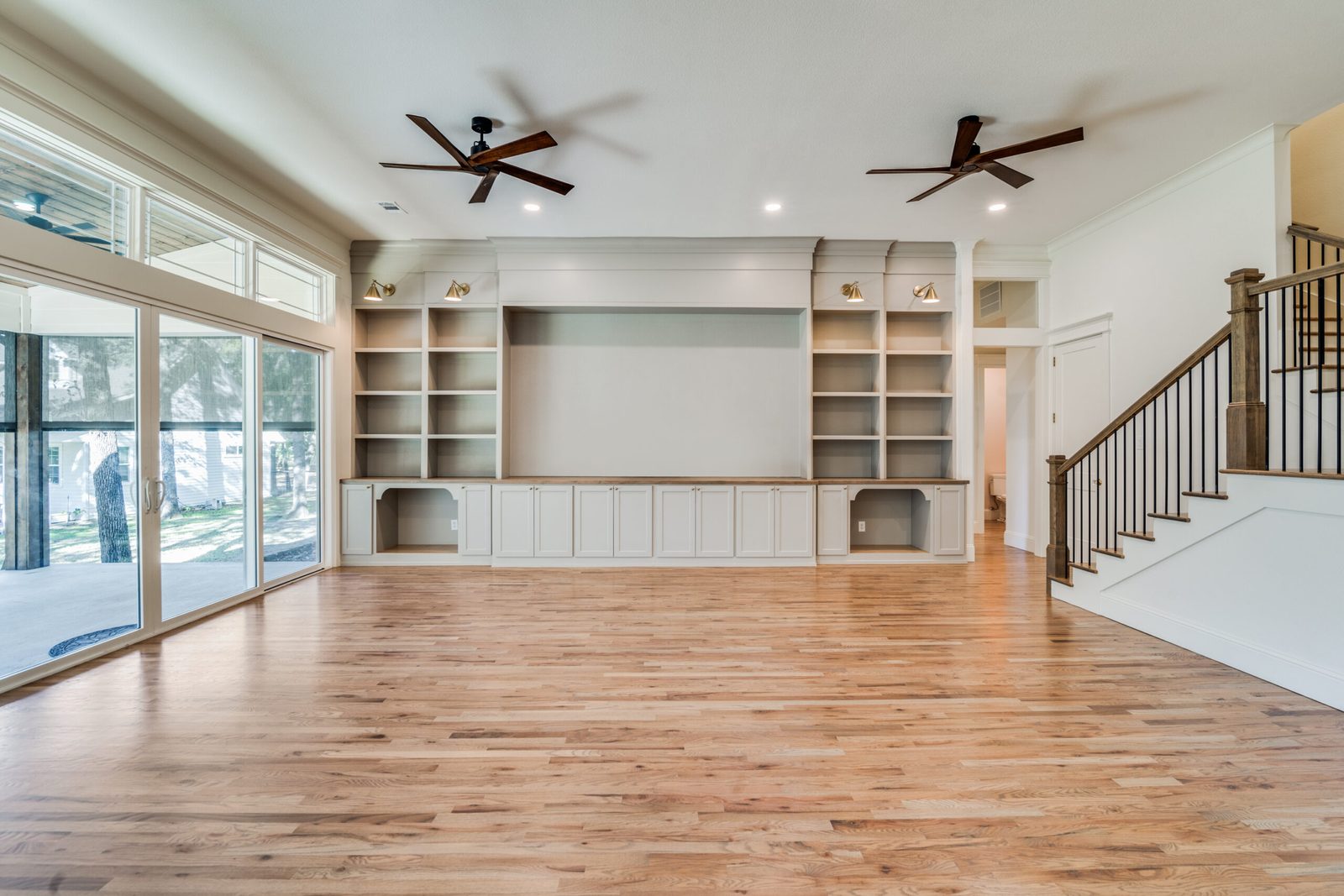 Open-concept living space with premium finishes in a Mcilrath Properties custom home